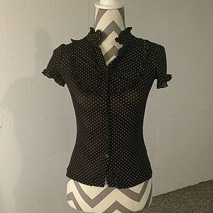 Black and white ruffled button up.